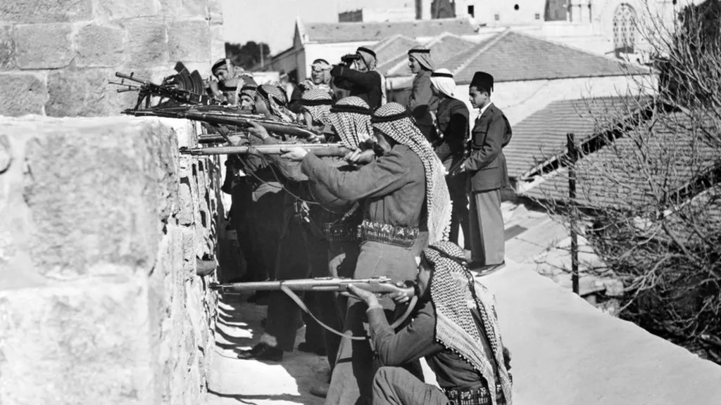1948年3月6日，阿拉伯军团盟军士兵从耶路撒冷东区向哈加纳犹太武装分子开火。阿拉伯人和犹太人的冲突。
